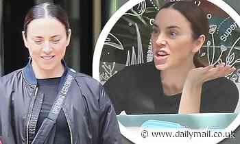 Mel C puts on an animated display as she joins a pal for lunch in north London