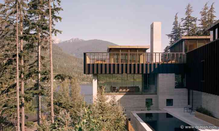 Concrete house by Gort Scott hugs rocky crag in Whistler