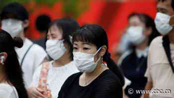 Tokyo sees record COVID-19 cases; mask sales up in U.S. following new guidance