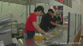 The ribbon is cut on East Amherst Rachel's Mediterranean location