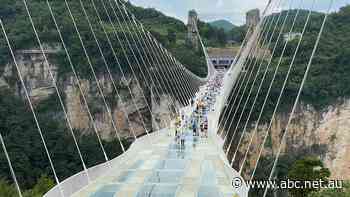 'It's kind of like skydiving': Chinese tourists take a leap in world's highest bungee jump