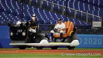 2020 Tokyo Olympics: Giant glove bullpen cart steals the show as baseball begins at the Summer Games