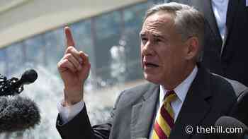 DOJ sues Texas over Abbott order restricting transportation of migrants