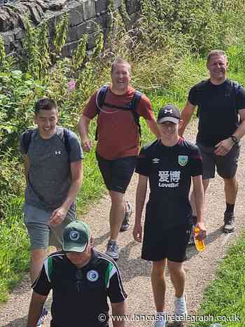 Friends raise over £3000 for sports charity after 75km walk