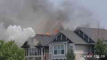 Two families displaced after two alarm house fire in southeast Calgary community - CBC.ca