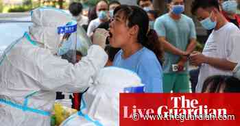 Coronavirus live: China facing worst outbreak in months; UK reports 26,144 new infections - The Guardian