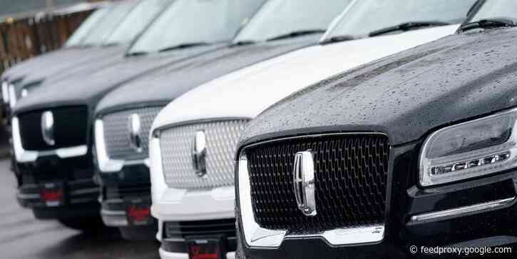 Auto dealers say today's red-hot market is a 'bizarro world' unlike anything they've ever seen - with cars selling before they hit the lot and clunkers worth more than ever