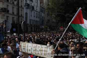 French police clash with anti-virus pass protesters in Paris - St Helens Star