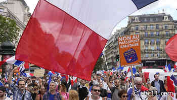 French police clash with anti-COVID passport protesters in Paris