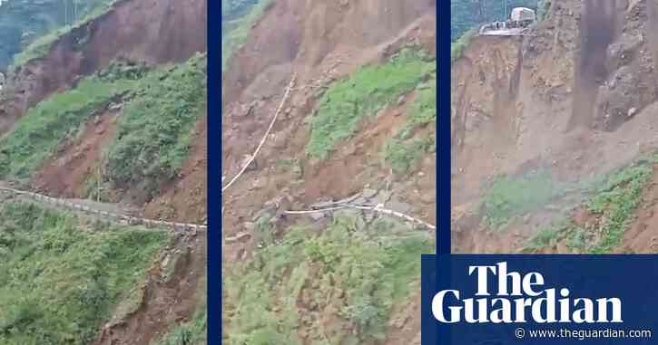 Massive landslide sweeps away portion of road in India – video