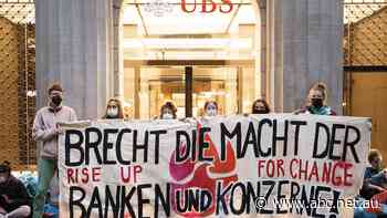 'Drawing attention': Climate activists occupy heart of Zurich financial district
