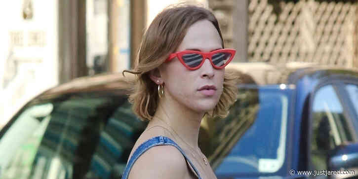 Tommy Dorfman Pairs Her Denim Dress With A Super Tiny Purse While Out in NYC
