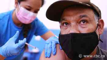 U.S. finally hits 70% vaccine target — a month late and amid a surge in COVID-19 cases