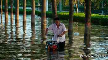 China flooding deaths triple to more than 300 after officials revise toll