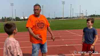 Bullied as a child, Indigenous coach Terry Crook now inspires young athletes on and off the track