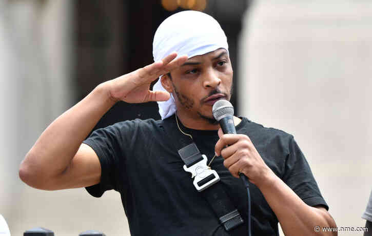 T.I. arrested in Amsterdam for being on his phone while cycling
