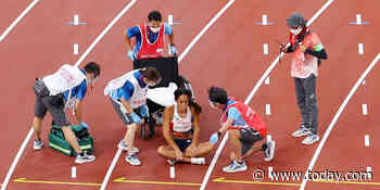 After collapsing on track, Olympic heptathlete gets back up to finish race