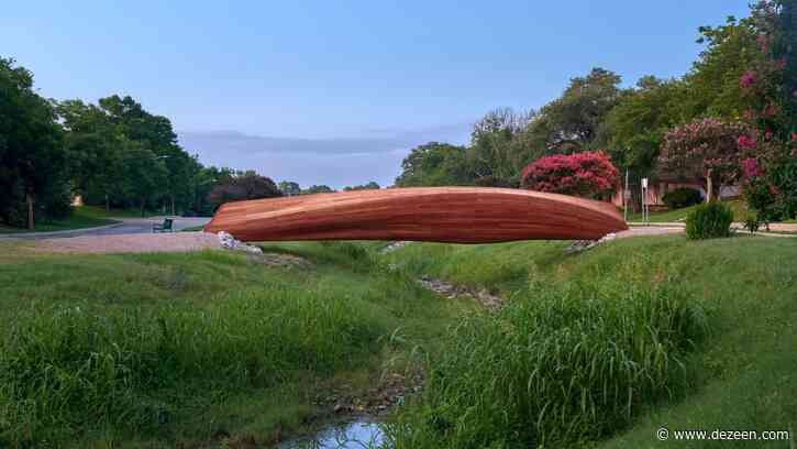 Volkan Alkanoglu designs cedar bridge to resemble a driftwood branch