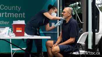 U.S. averaging 100,000 COVID-19 cases daily amid low vaccination rates in hard-hit areas