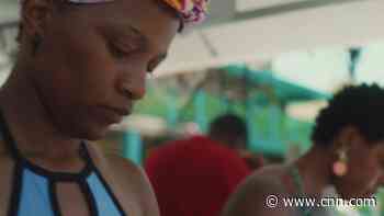 To face her fear of water, she turned to diving