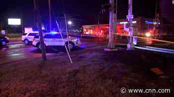 Two men were killed by a train while mourning their brother killed in the same spot
