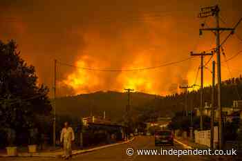 Greece fires: Thousands flee homes as blaze ravages Greek island amid ‘nightmarish summer’