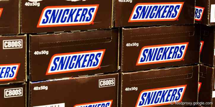 Snickers pull TV ad featuring a man who stops flirting with another man when he eats a Snickers bar