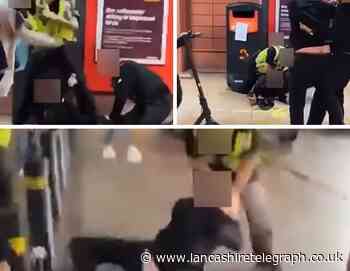 Probe after officer appears to push woman and drag man in road outside Sainsbury's