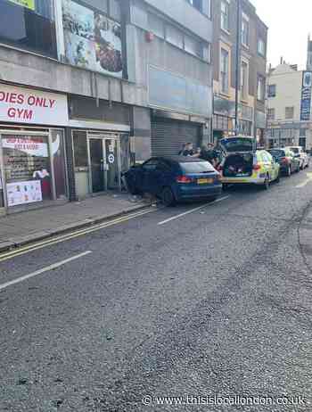 Driver flees police after ploughing into Gravesend building