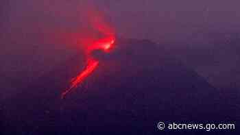 Indonesian volcano churns out fresh clouds of ash, lava