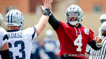 LOOK: Cowboys' Dak Prescott resumes throwing in practice, tosses passes to Amari Cooper