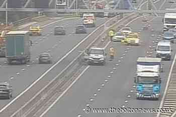 M60: Driver in hospital after falling ill near Trafford Centre - The Bolton News