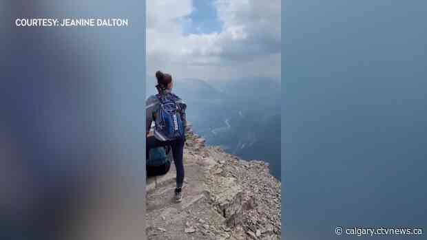 Calgary woman reaches 3 mountain summits to raise funds for siblings with terminal illness