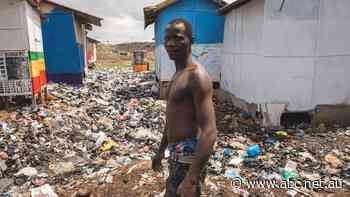 'It’s an insult': In an African clothing market, a bale of used clothes donated by Australians is opened