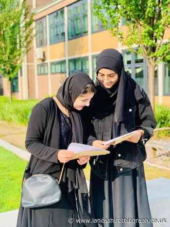'On cloud nine' - three pupils get top GCSE grades