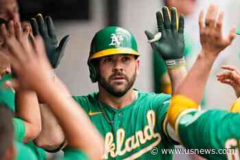Moreland 2 HRs, Bassitt AL-High 12th W, A's Bop Indians 17-0