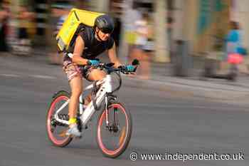 Food delivery firms under scrutiny as new Spain law kicks in - The Independent