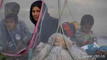 Families and children forced to flee as Taliban capture more cities in Afghanistan