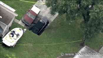 Car Partially Swallowed by Hole in Florida Driveway