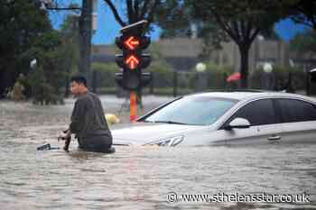 Fresh flooding in central China kills another 21 people - St Helens Star