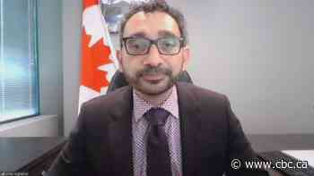 Transport minister is asked what would happen if federal workers refuse vaccines