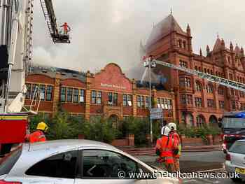 Fire service tackle fire at unoccupied building in Stretford - The Bolton News