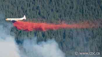 Wildfire near Dead Man's Flats now held, as crews extinguish hotspots via helicopter