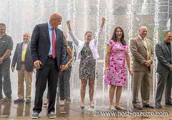 IN FOCUS | On a hot day, for a good cause, getting soaked suited them