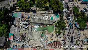 Rescuers battle to find Haiti quake survivors as death toll hits 724