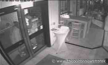 Man cracks Bolton bar's glass door with his head