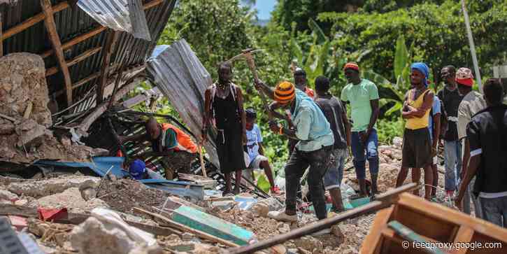 Photos, videos show Haitians scrambling to find survivors of the 7.2-magnitude earthquake as Tropical Depression Grace approaches