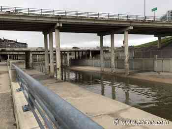 Concrete is impervious. Why are Houston's bayous lined with it?