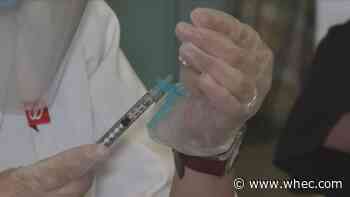 Local doctors looking over guidance on COVID booster