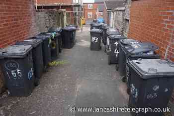 Residents bemoan having to place bins at end of long alleyway